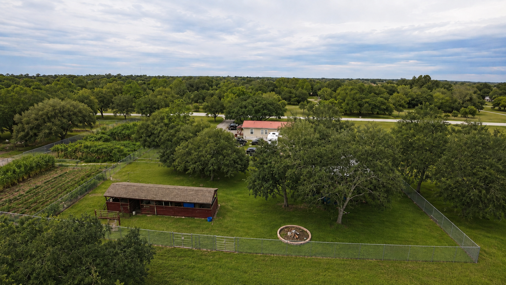 Aerial view of 145 N Datil St home, pool and pasture in Montura Ranches, Florida