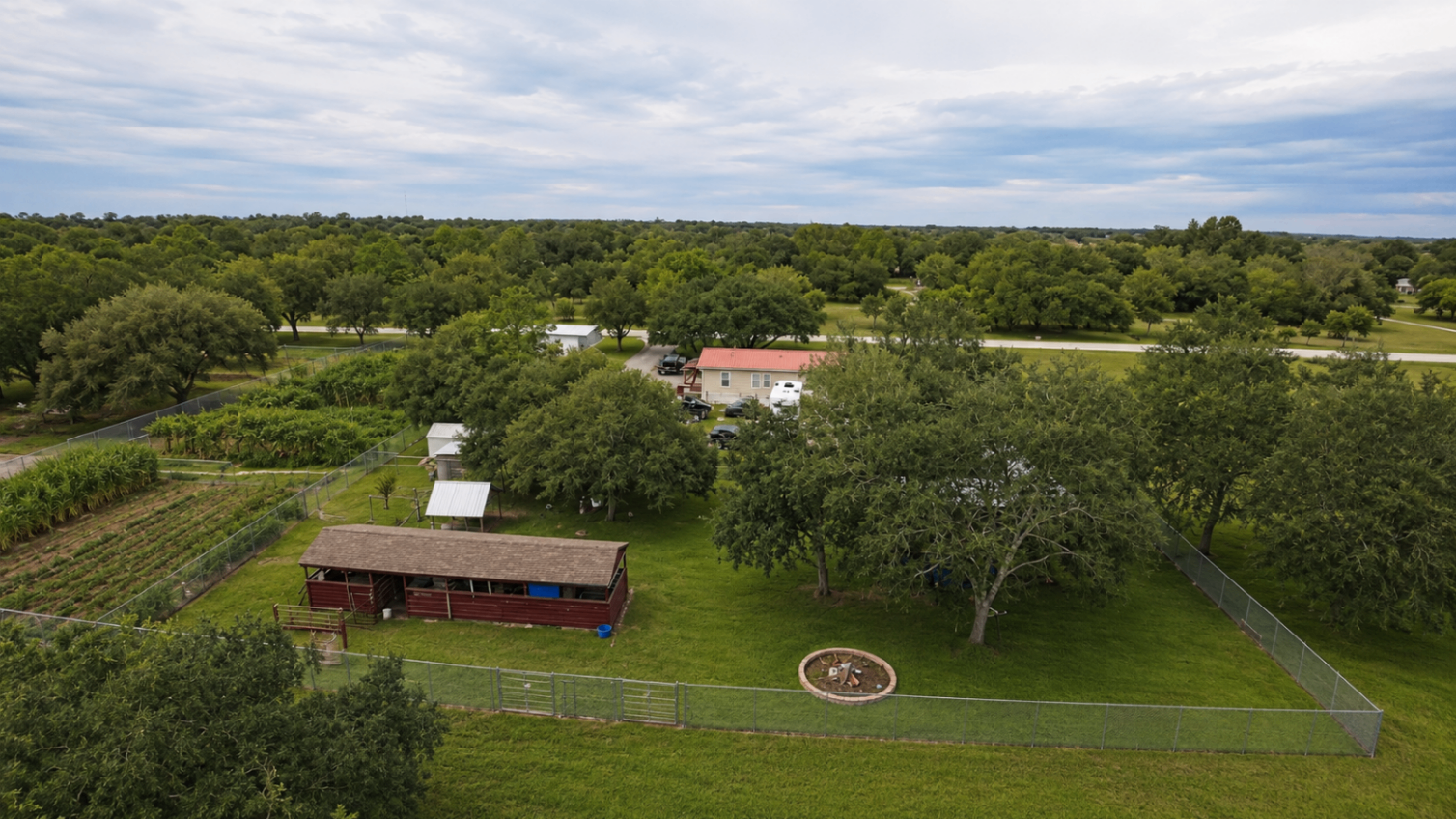 Aerial view of 145 N Datil St home, pool and pasture in Montura Ranches, Florida